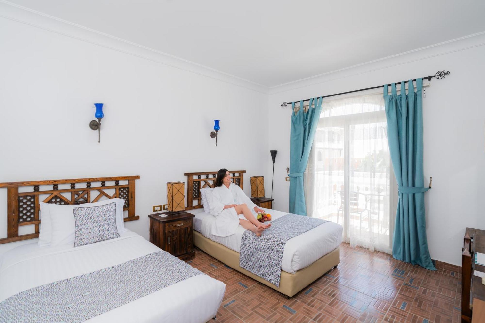 Sunrise Garden Beach Resort Hurghada Camera foto A guest room at the hotel